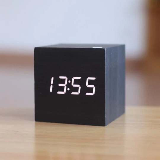 Black wooden cube LED clock with white digits