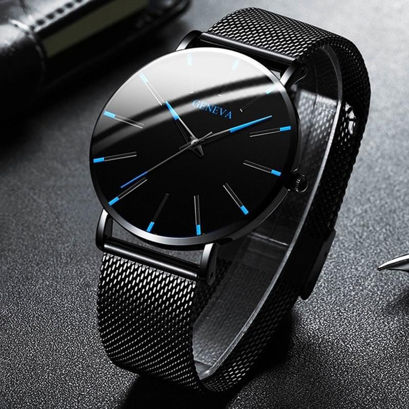Minimalist black mesh watch flat lay